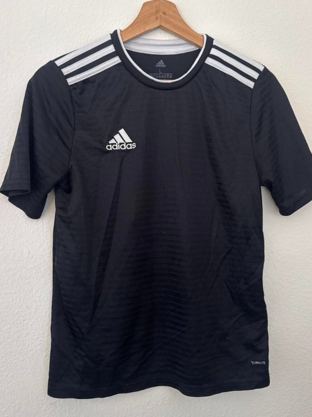 Adidas black & white jersey with subtle textured pattern, size youth L